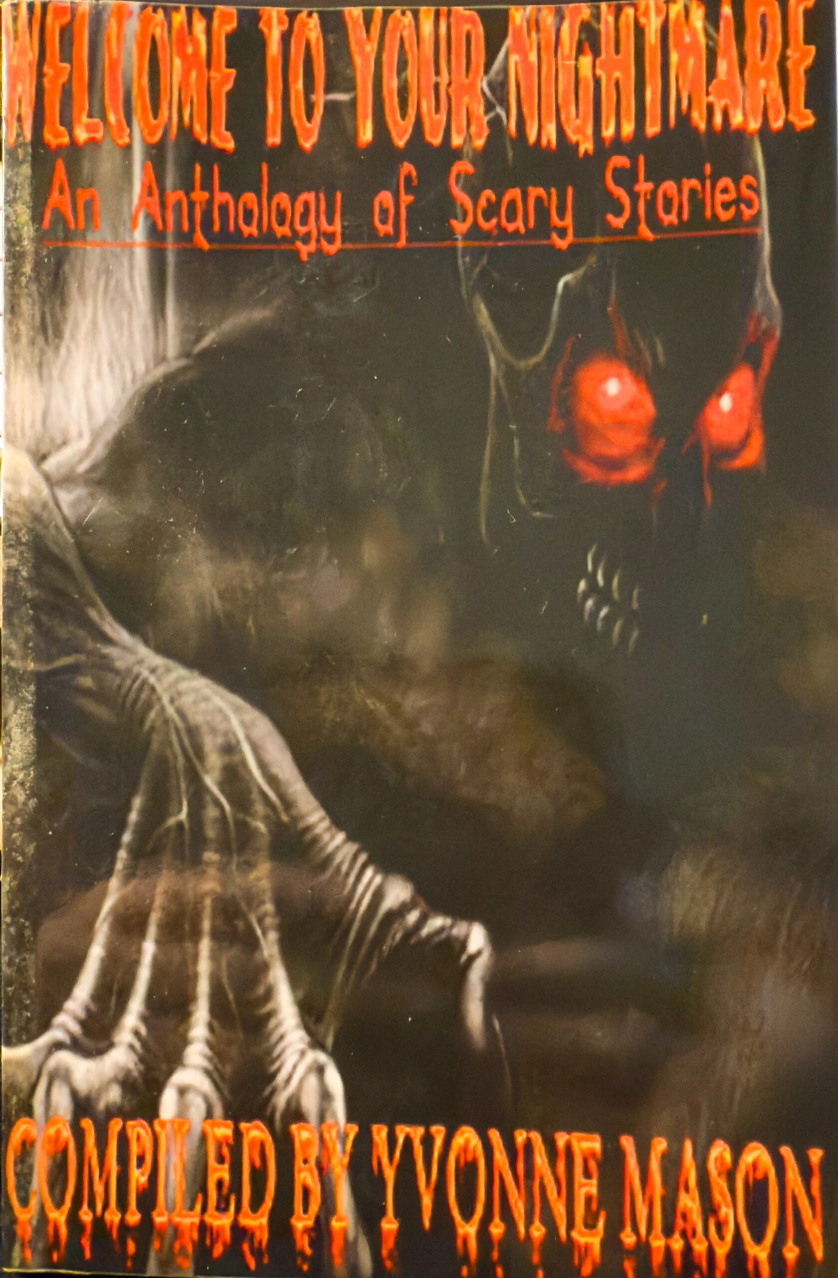 Cover of Welcome to Your Nightmare: An Anthology of Scary Stories compiled by Yvonne Mason. A skeletal figure with glowing red eyes reaches forward from the shadows.