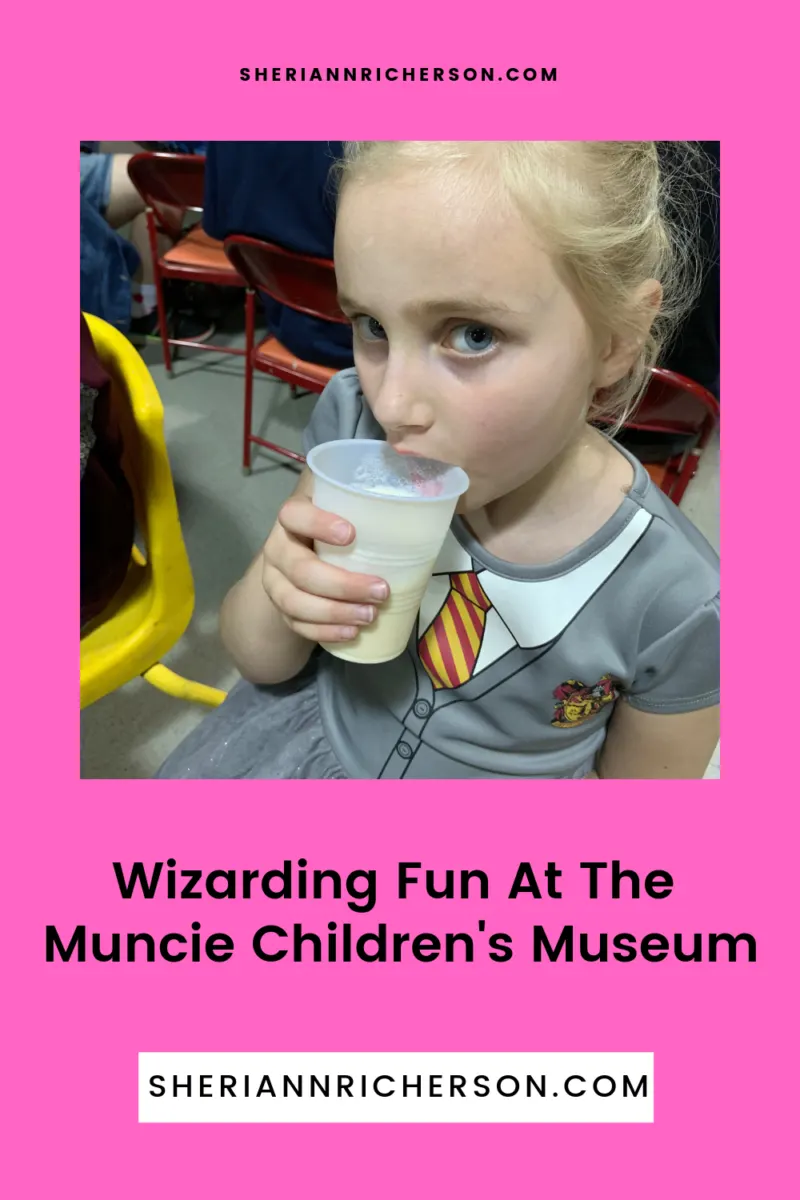 One of my grandchildren drinking Butterbeer.