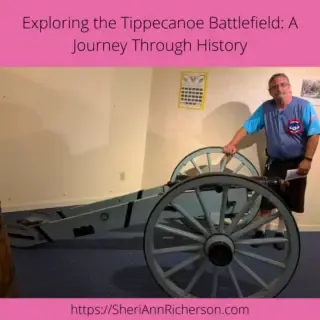 Jeffrey Rhoades standing with a canon from the Tippecanoe Battle.