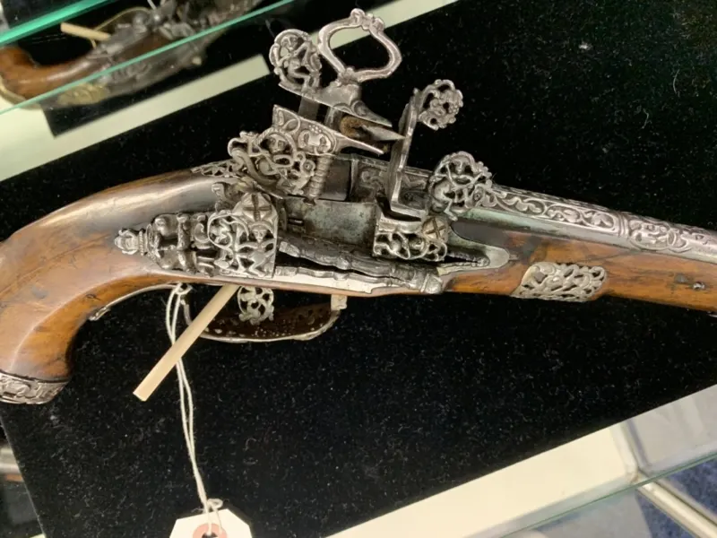 An ornate antique gun.