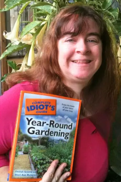 Sheri Ann Richerson holding The Complete Idiot’s Guide to Year-Round Gardening