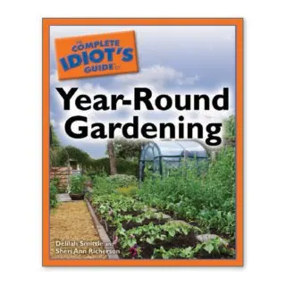 Book cover of The Complete Idiot’s Guide to Year-Round Gardening by Sheri Ann Richerson and Delilah Smittle, showing bright vegetables and gardening tools that represent extending the growing season.