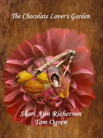 Book cover of The Chocolate Lover’s Garden by Sheri Ann Richerson and Tom Ogren, featuring a Dahlia ‘Arabian Nights’ bloom with cacao pods, one of which reveals a hidden boa.